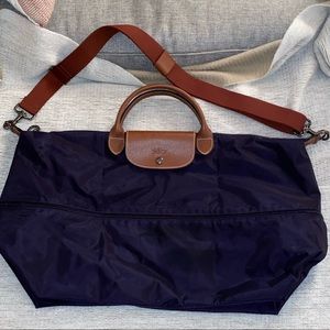 Longchamp purple expandable Travel bag